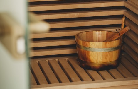 a wooden bucket on a bench