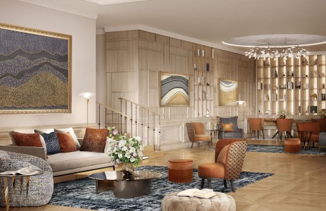 a living room with a couch and chairs