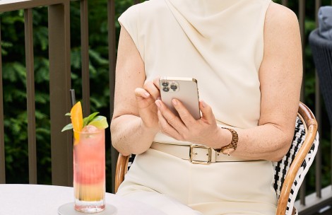 a woman holding a phone