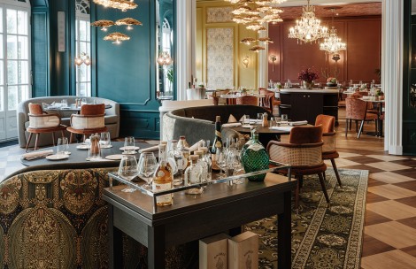 a restaurant with tables and chairs