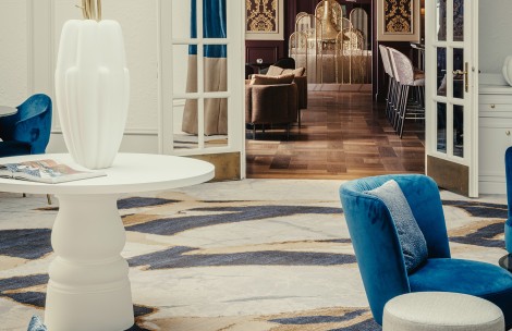 a room with a white table and chairs