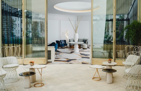 a glass doors leading to a room