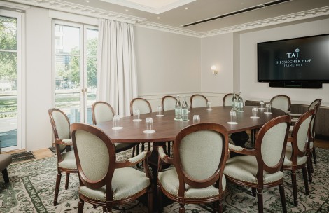 a room with a table and chairs
