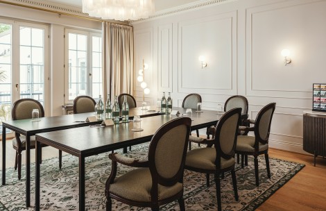 a room with a table and chairs