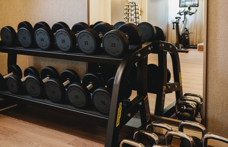 a rack of weights in a gym