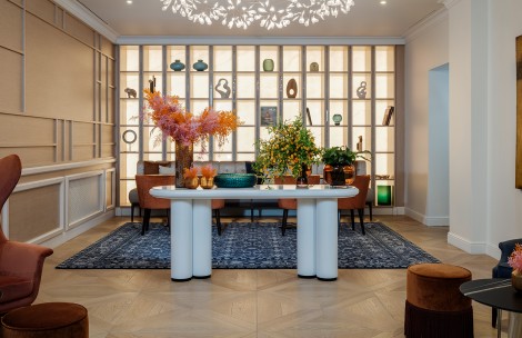 a room with a table and chairs