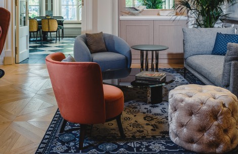 a room with chairs and tables