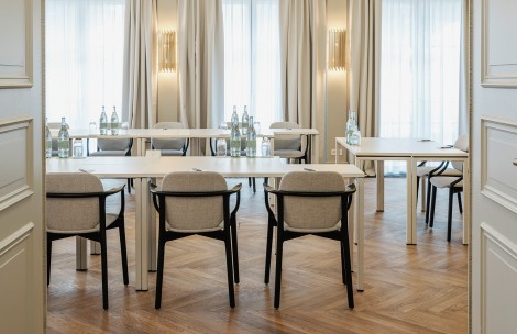a room with tables and chairs