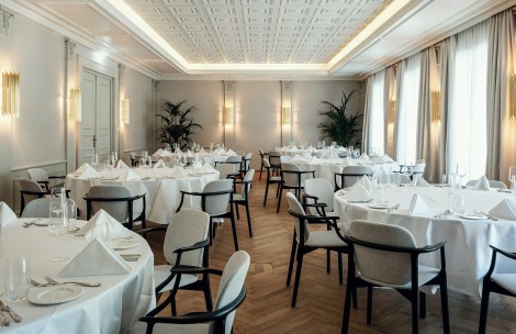 a room with tables and chairs