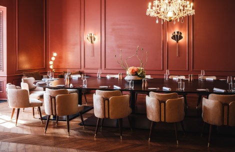 a room with a table and chairs