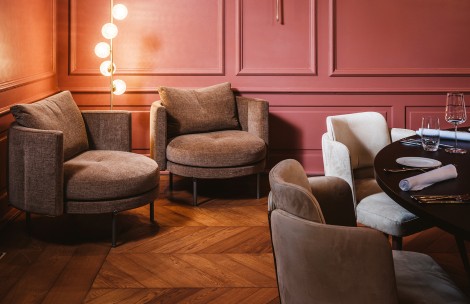 a group of chairs and a table in a room