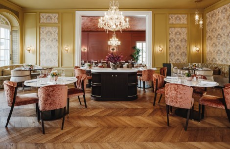 a room with tables and chairs