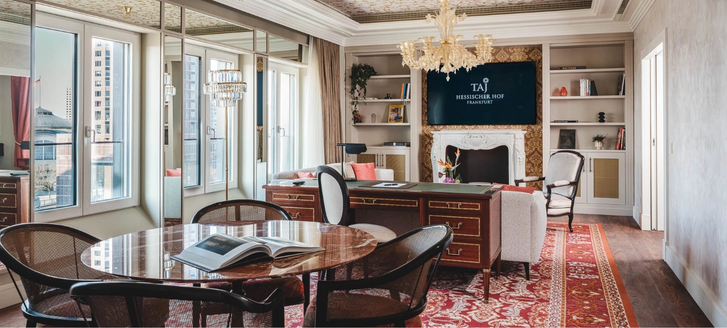 a room with a table and chairs