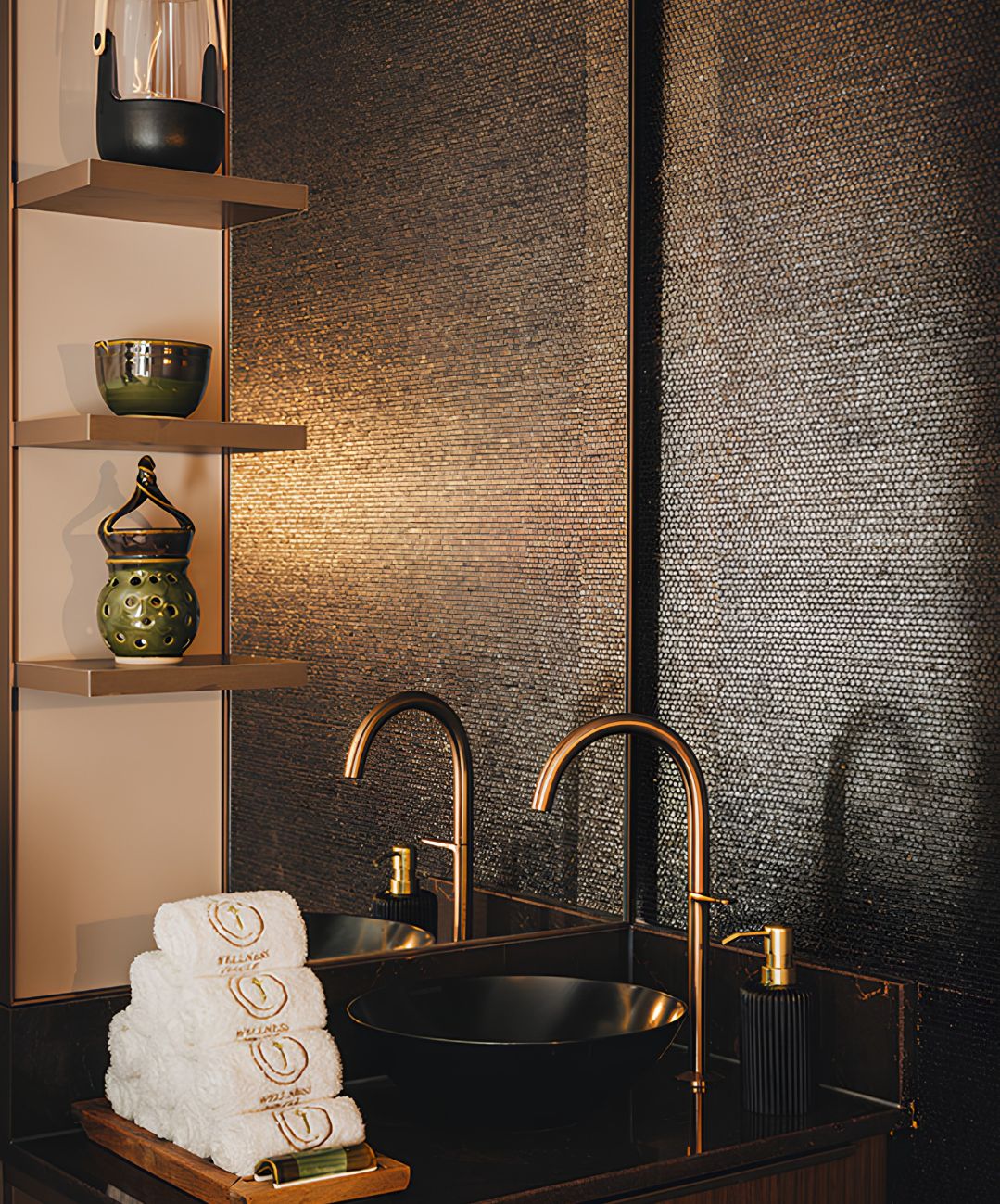 a bathroom with a sink and towels