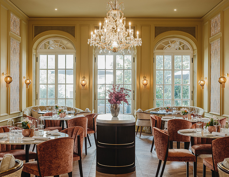 a room with tables and chairs