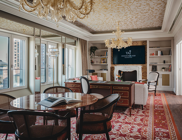 a room with a fireplace and a table