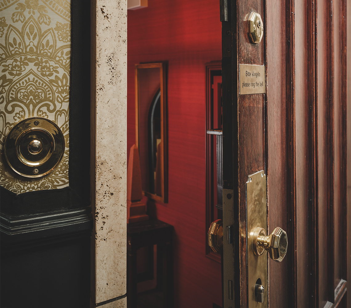 a door with a gold knob