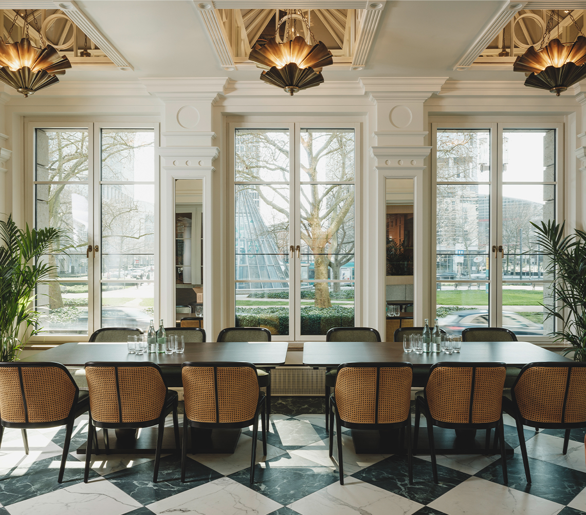 a room with a table and chairs