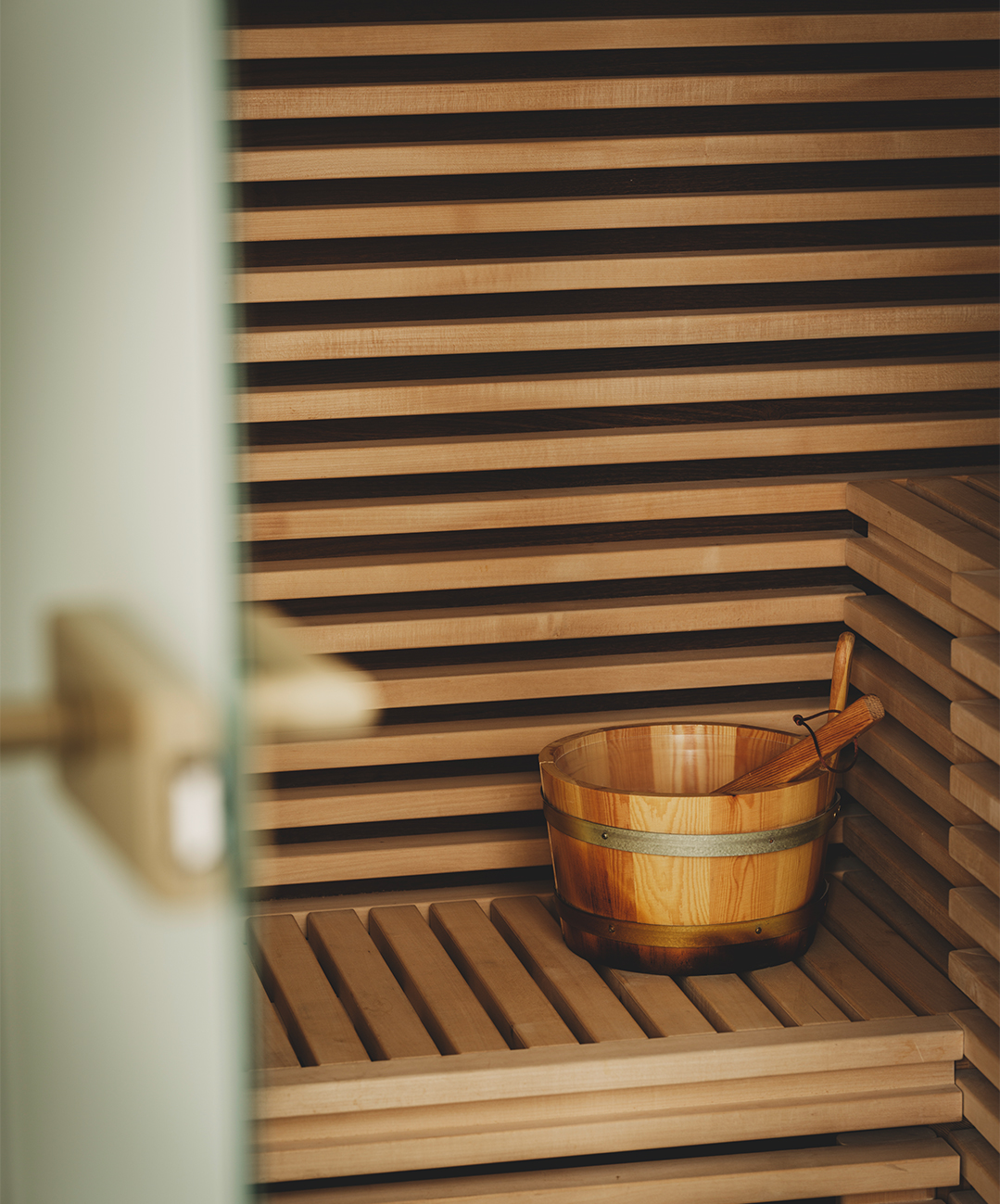 a wooden bucket on a shelf