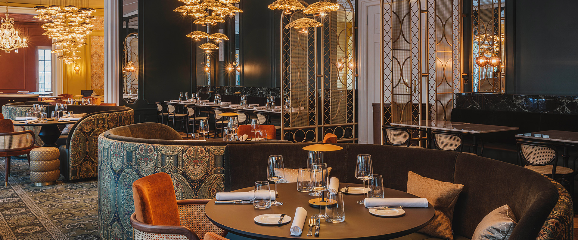 a restaurant with tables and chairs
