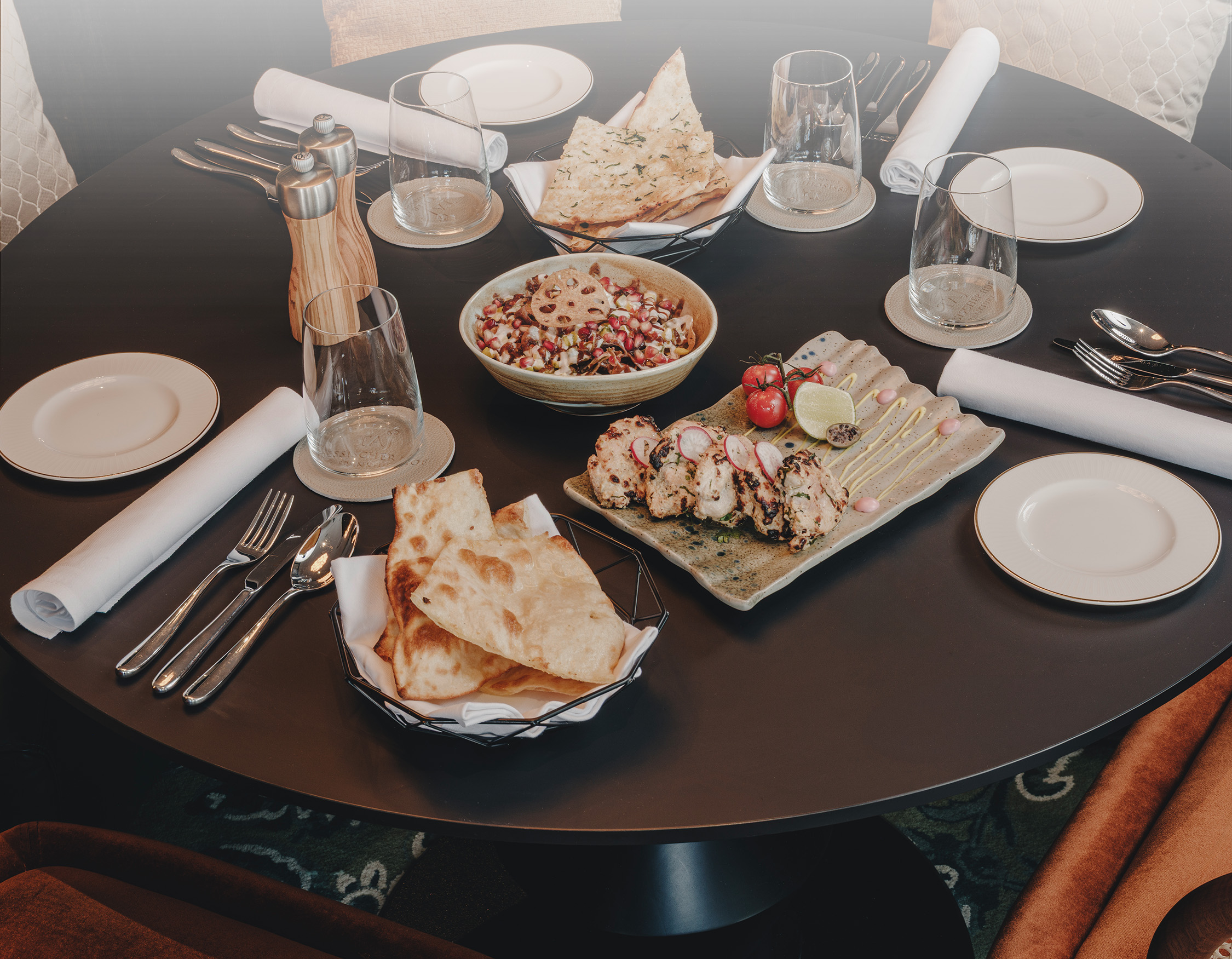 a table with plates and food on it