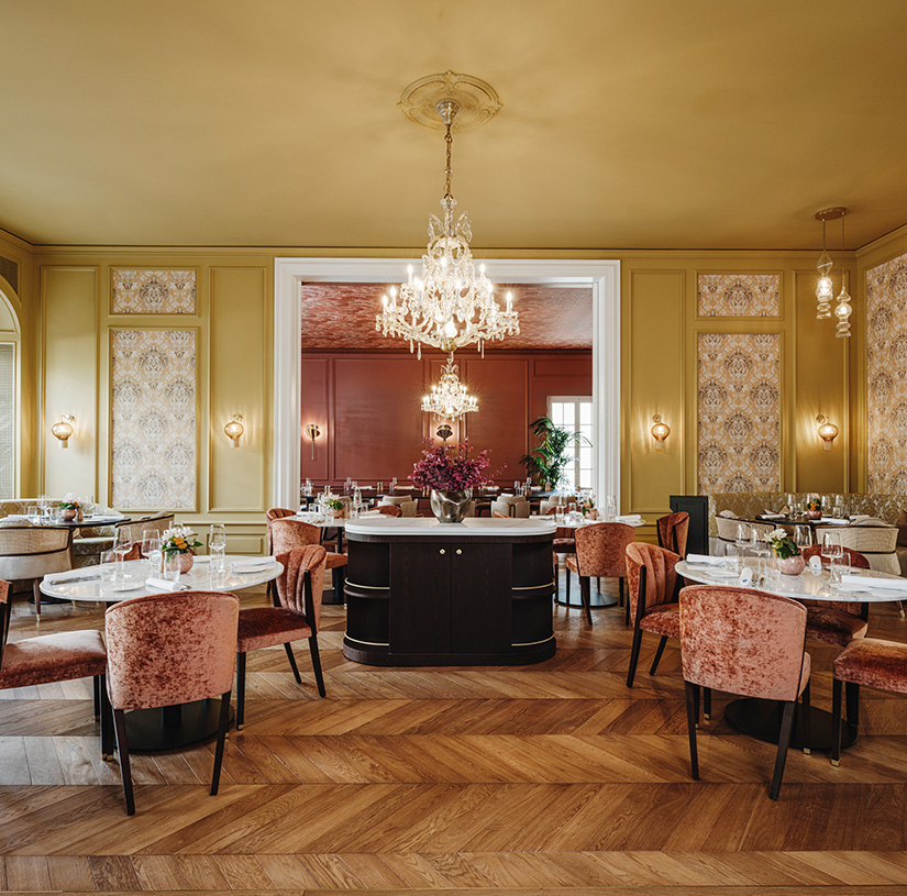 a room with tables and chairs