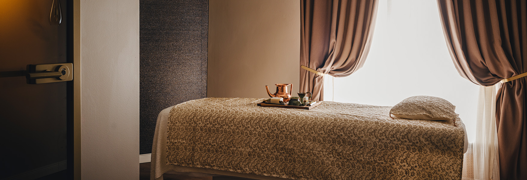 a tray of tea on a bed