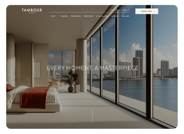 a large room with large windows and a large city view