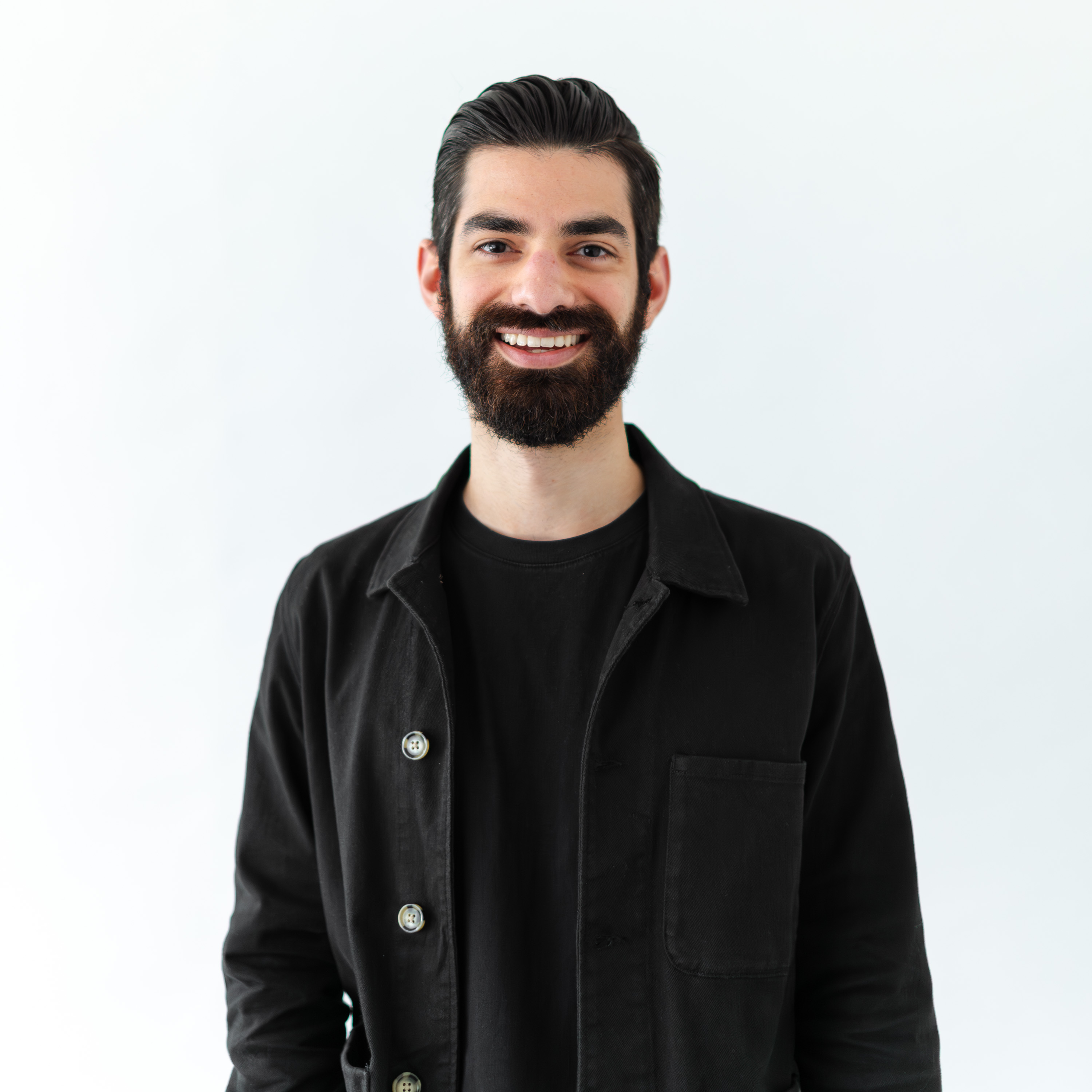 a man smiling at camera