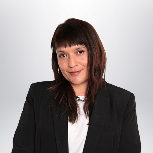 a woman in a black suit
