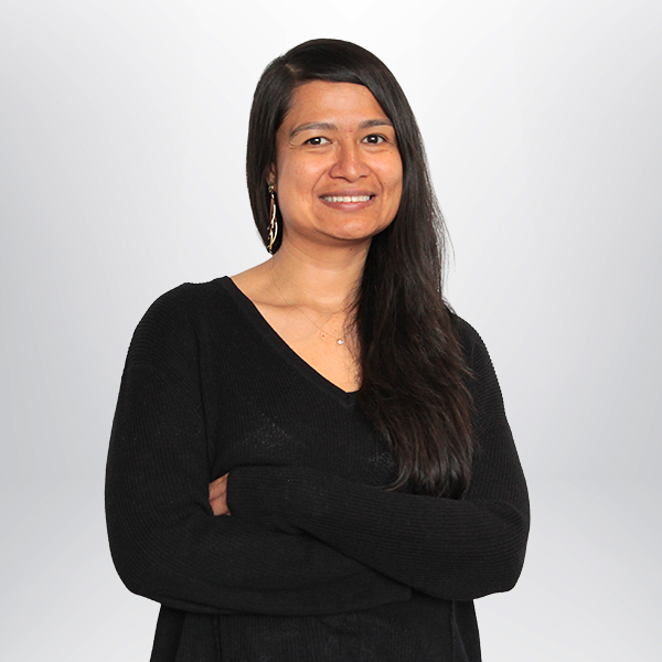 a woman with long hair wearing a black sweater