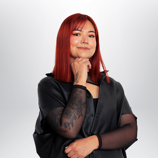 a woman with red hair and tattoo on her arm