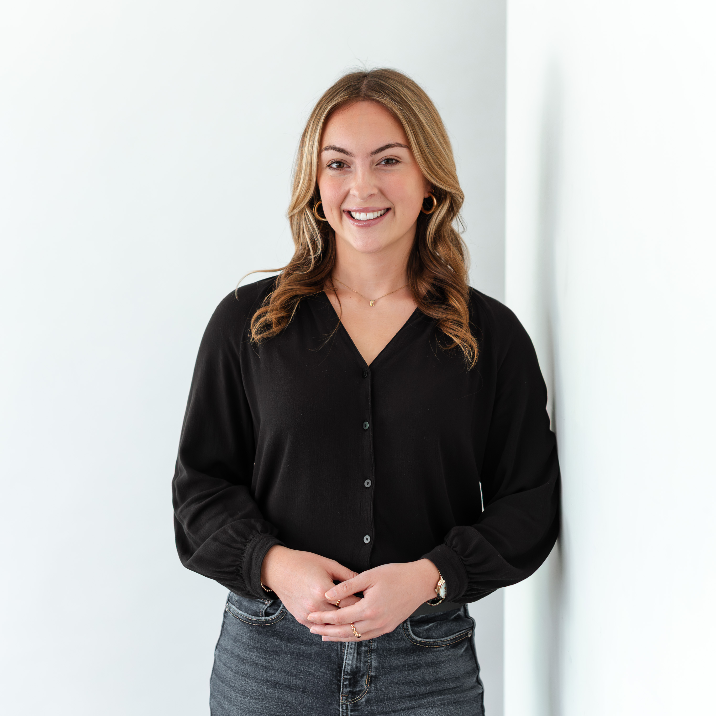 a woman smiling at camera
