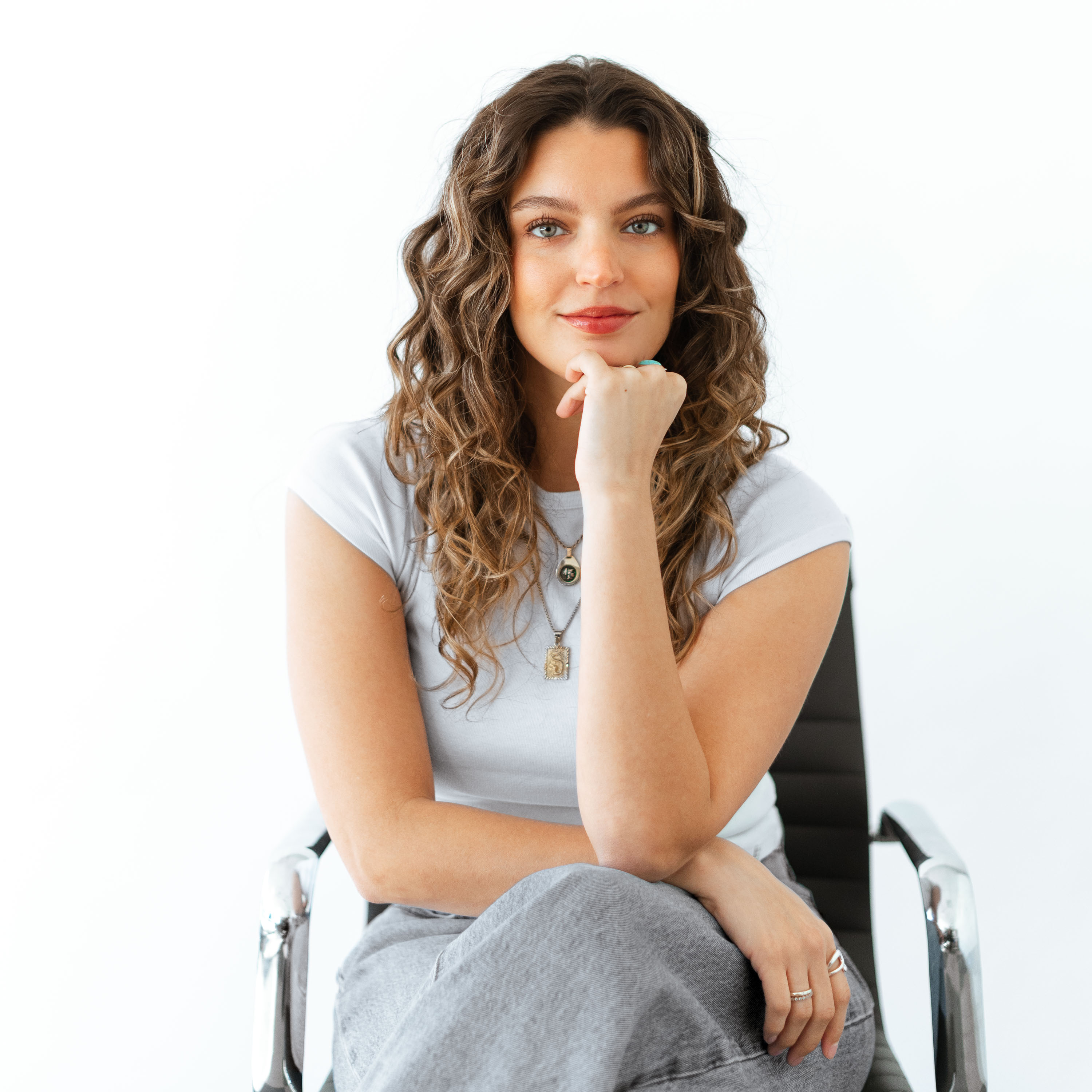 a woman sitting in a chair