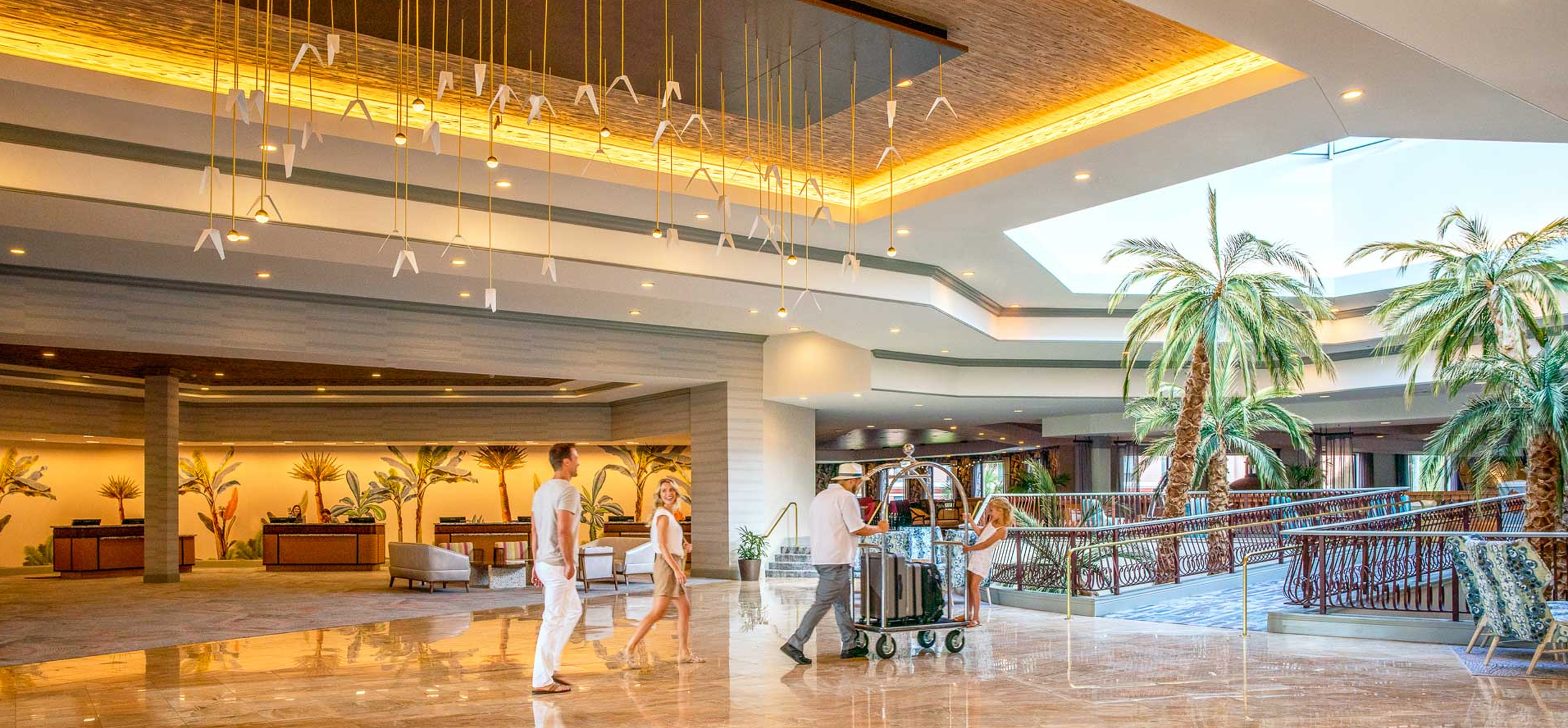 a group of people in a hotel lobby