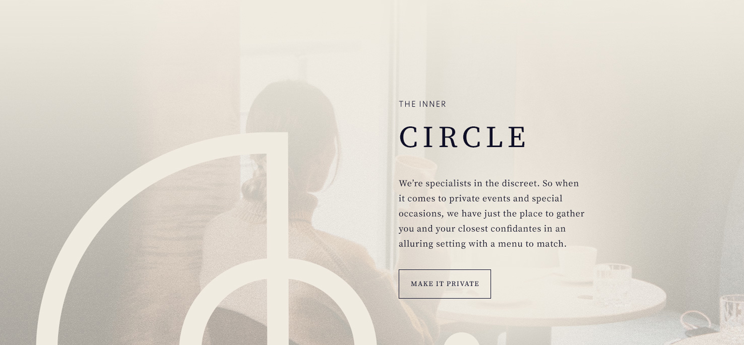 a woman sitting in front of a window