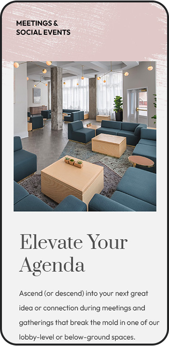 a room with blue couches and coffee tables