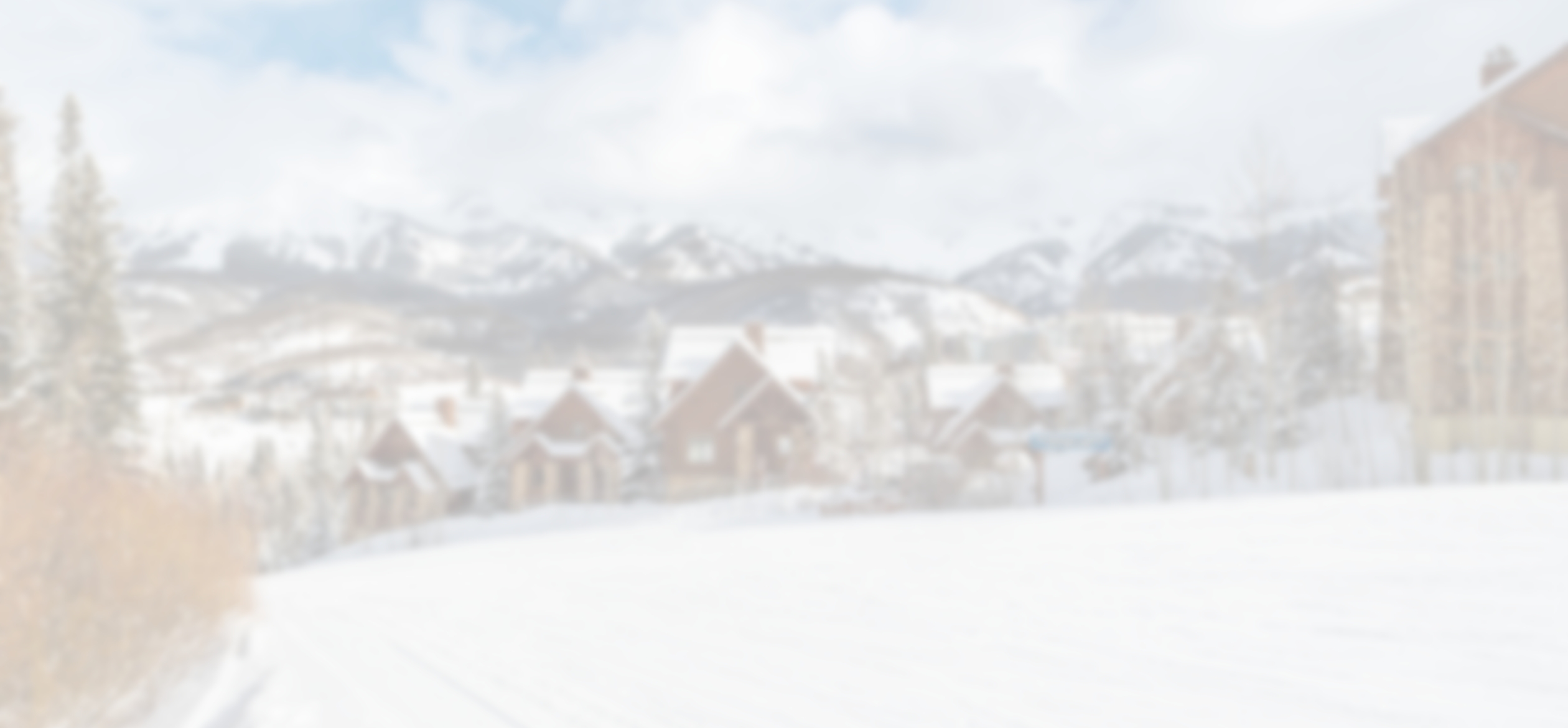 a blurry image of a snowy landscape