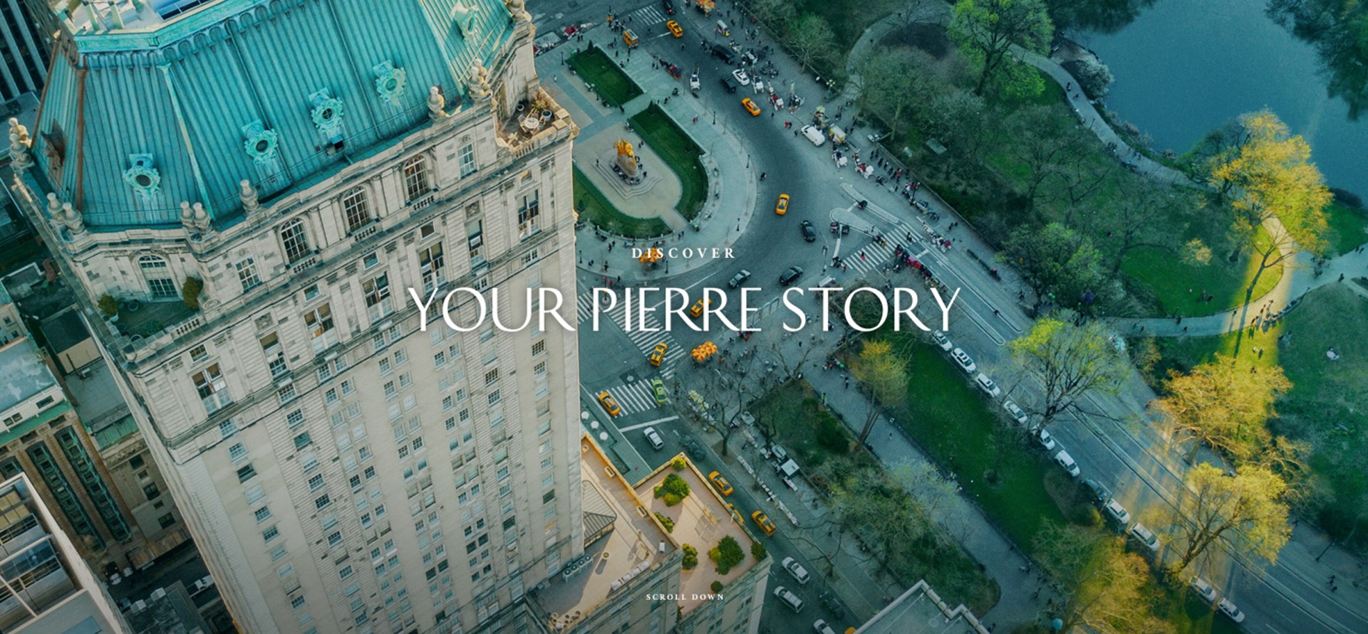 aerial view of a city with a street and buildings