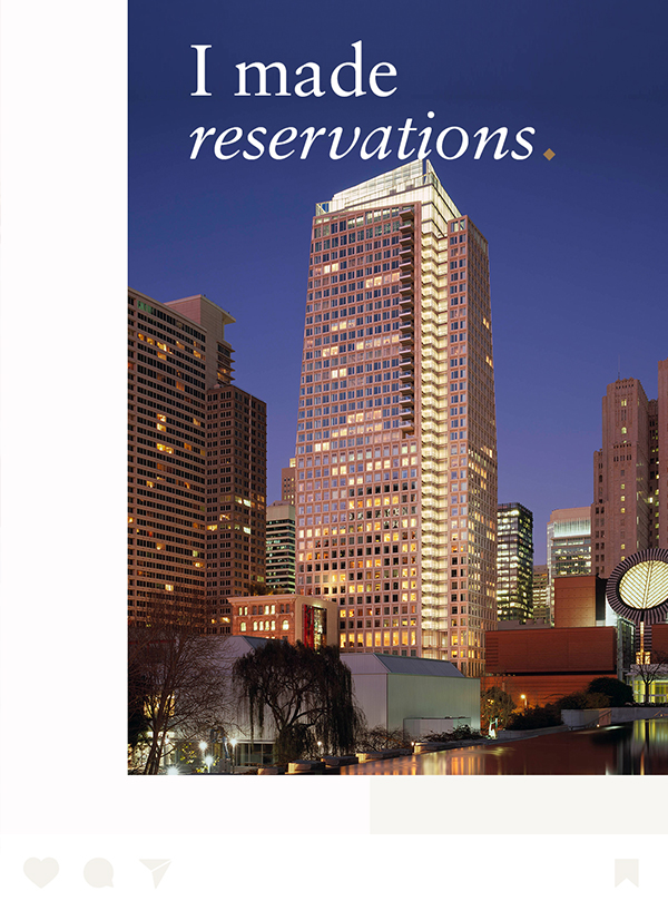 a city skyline with a reflection of water