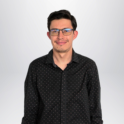 a man wearing glasses and a black shirt