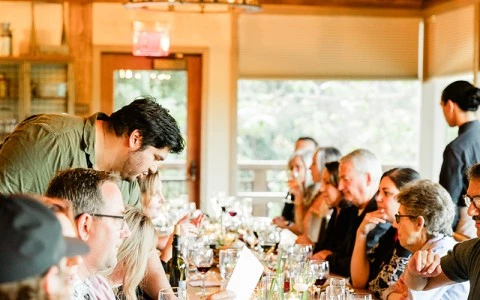 a group of people sitting at a table