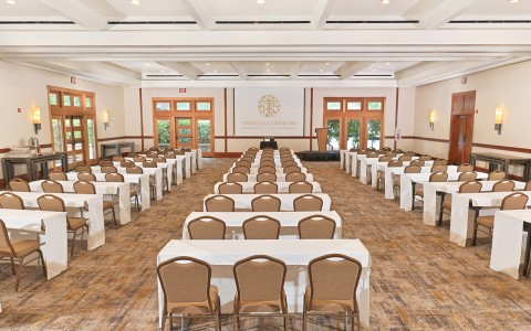 a room with tables and chairs