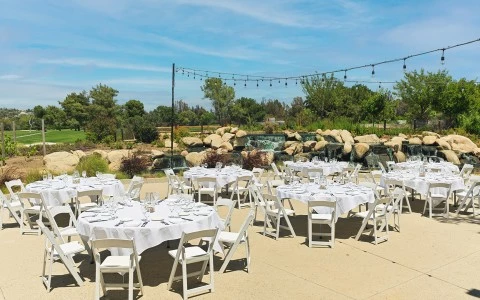 a group of tables set up outside