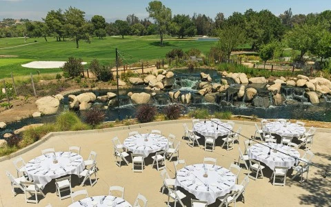 a group of tables and chairs outside