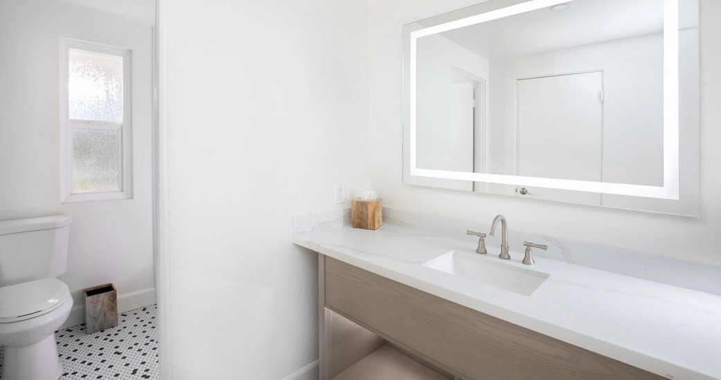 a bathroom with a mirror