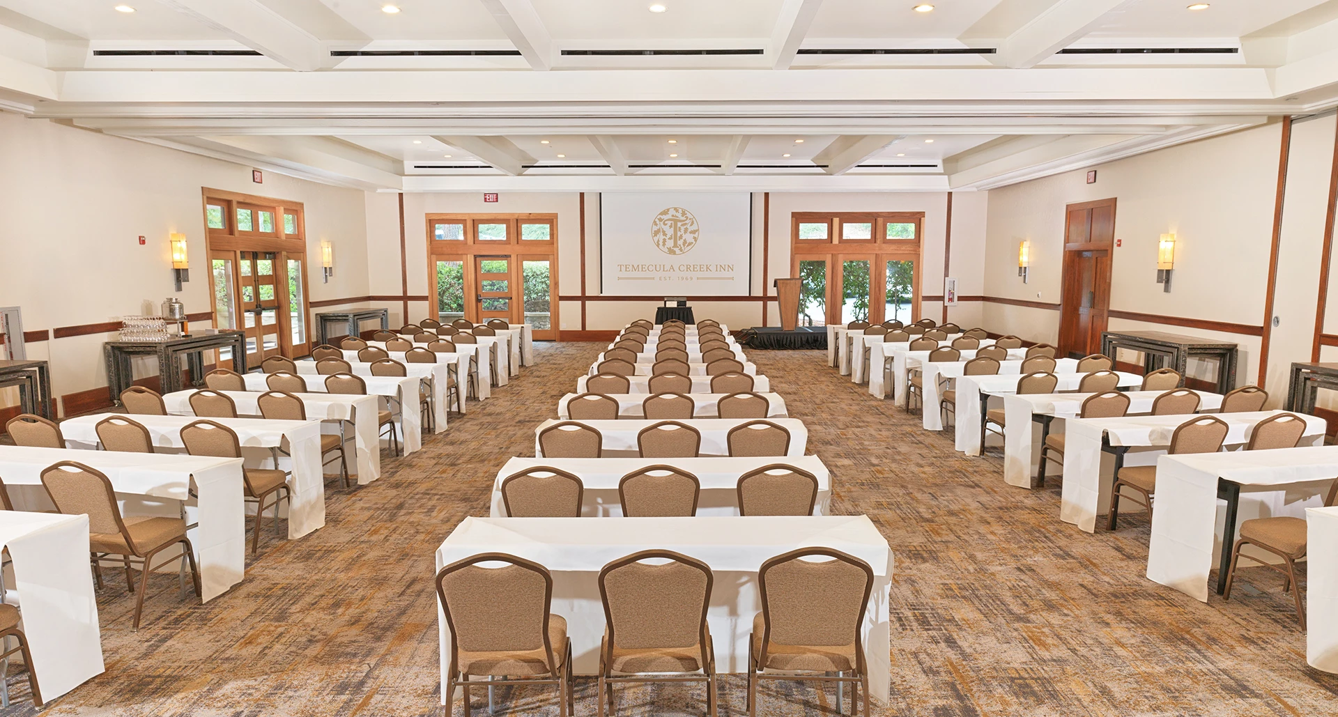 a room with tables and chairs