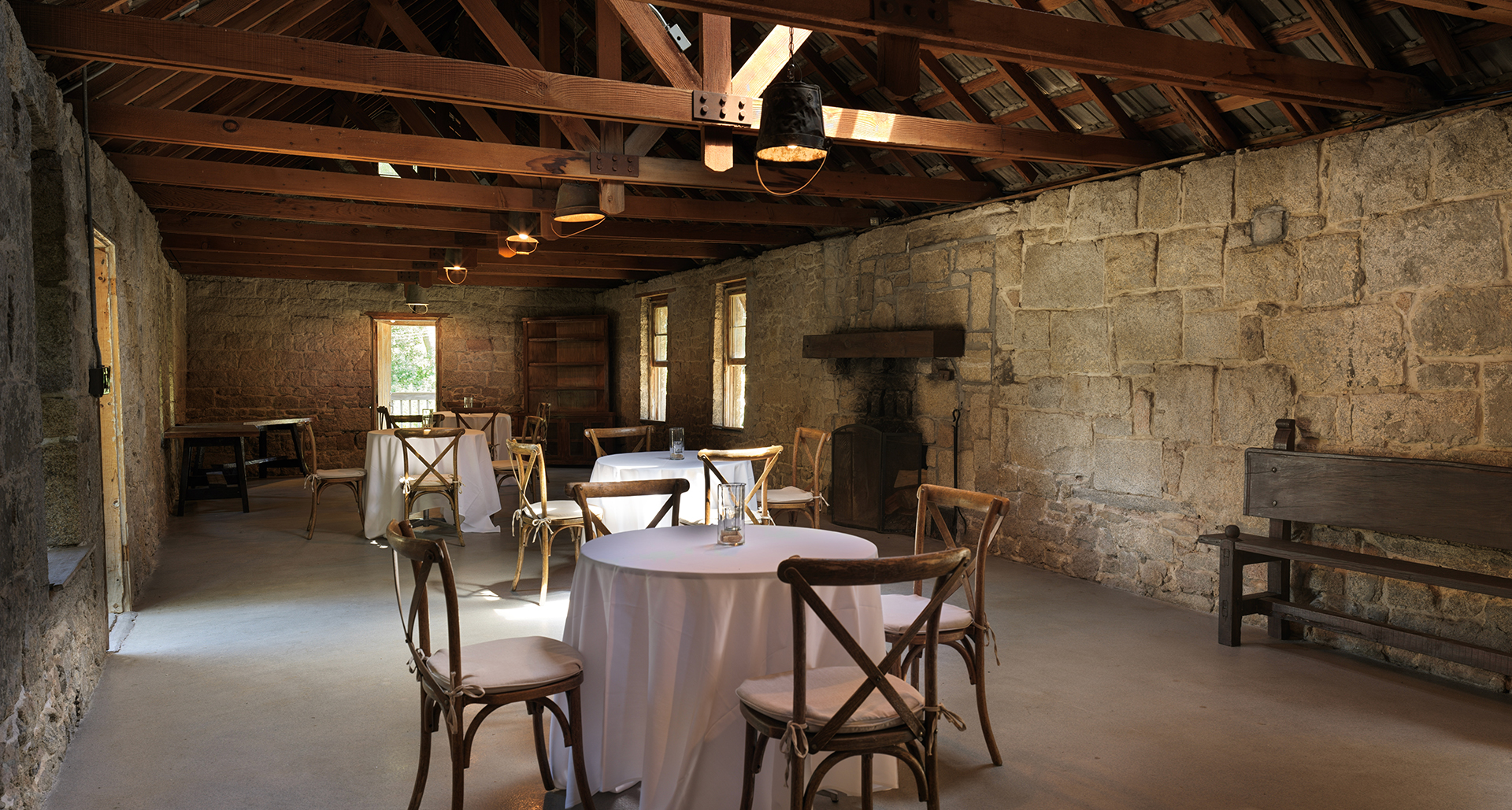 a room with tables and chairs