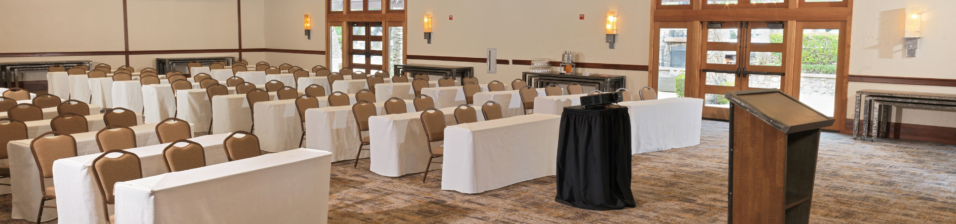 a room with chairs and tables