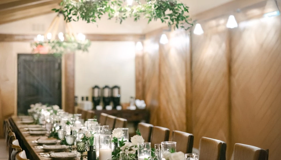 a table set with candles and flowers